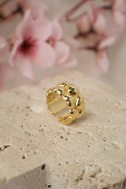 Anillo de corazones de rodio