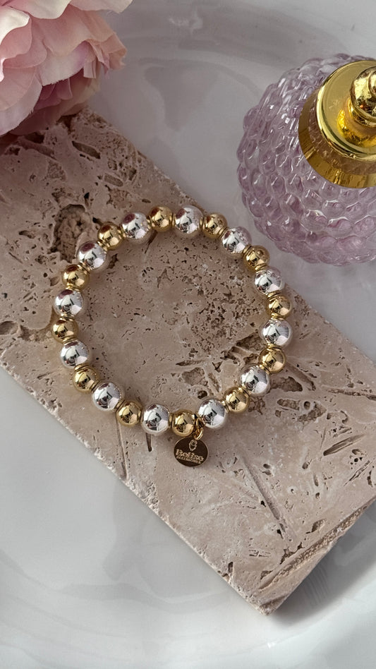 Pulsera de oro y plata